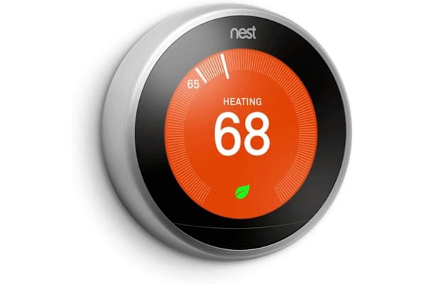 A Nest thermostat displays a heating temperature of 68 degrees. at The Revival, Salt Lake City, UT 84101